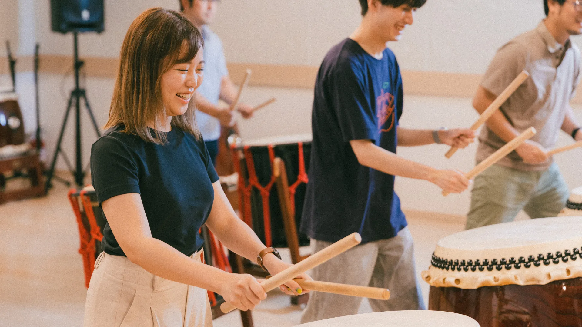 Use Japanese drums to improve organizational efficacy by matching sounds in pairs or groups.